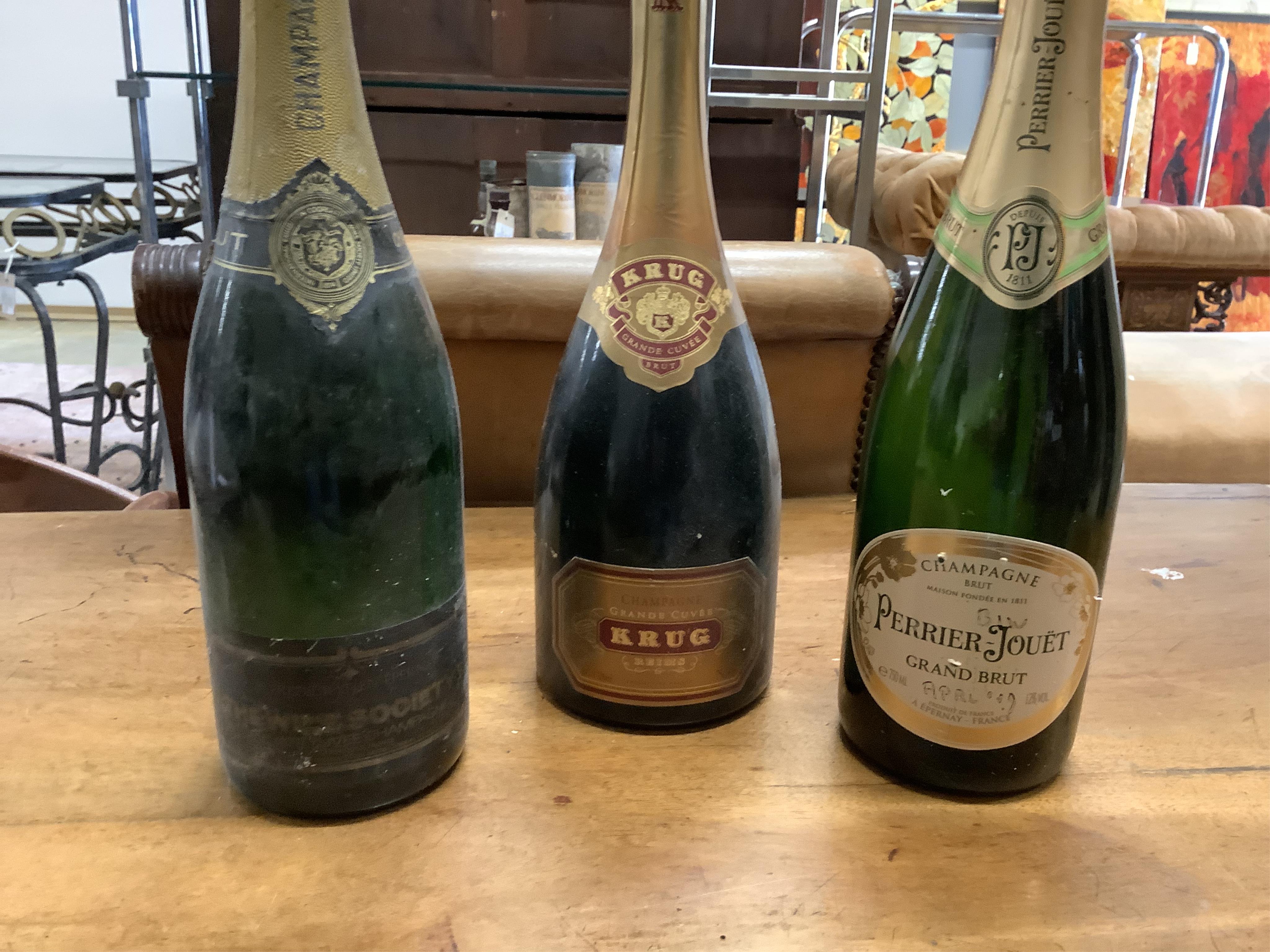 Ten bottles of assorted champagne to include Krug, Taittinger, Laurent-Perrier and Moët. (From a local private cellar). Condition - some labels degraded